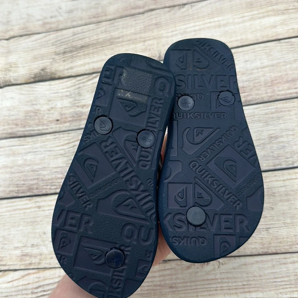 Quicksilver Blue and Yellow Flip Flops Size 11/12